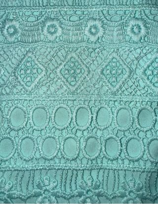 Top de encaje turquesa de H&M