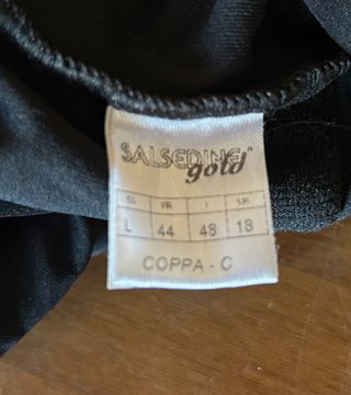 Top - costume intero nero - pietre verdi