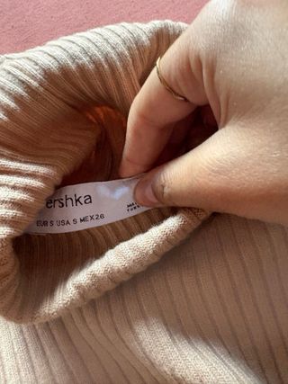 Jersey cuello alto beige