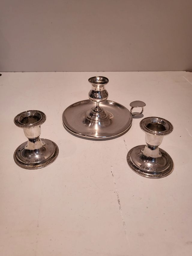 Juego portavelas plateado