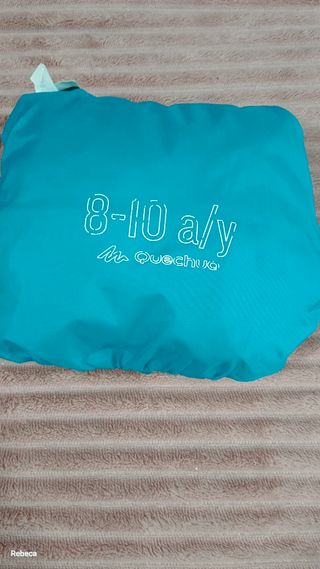 Chubasquero Quechua turquesa talla 8 a 10 años 