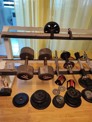 Banco pesas + discos musculación