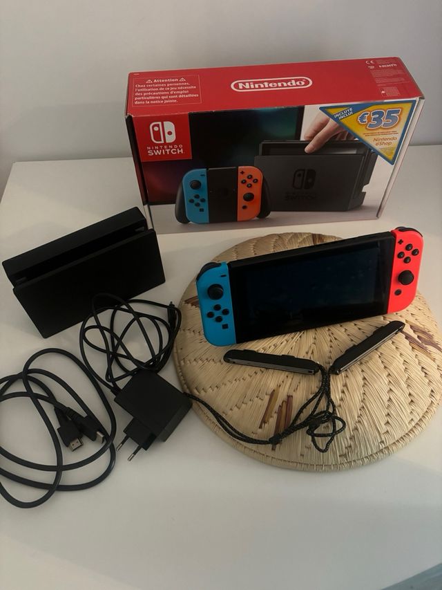 Nintendo Switch V1 Azul-Rojo + Juegos y Accesorios