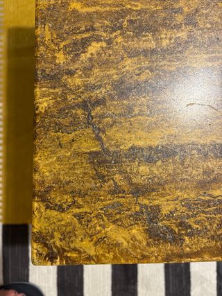 Mesa centro mármol dorado