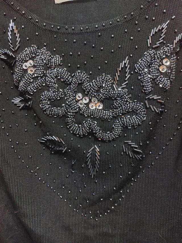 Top negro NIDBIO con lentejuelas