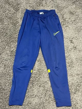 Pantalón Nike azul y amarillo flúor, deportivo. 


