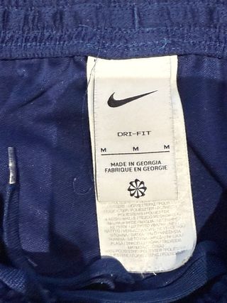 Pantalón Nike azul y amarillo flúor, deportivo. 


