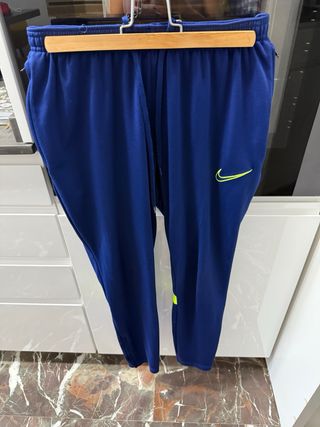 Pantalón Nike azul y amarillo flúor, deportivo. 

