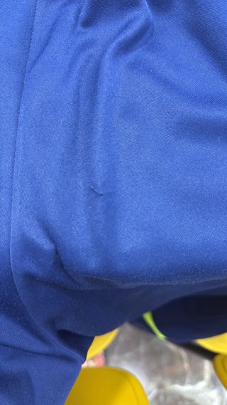 Pantalón Nike azul y amarillo flúor, deportivo. 

