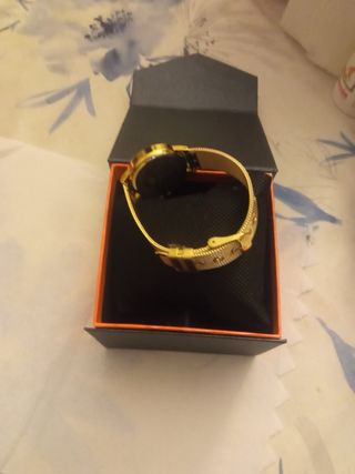 Reloj Marea dorado