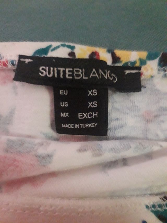 Blusa blanca estampada flores