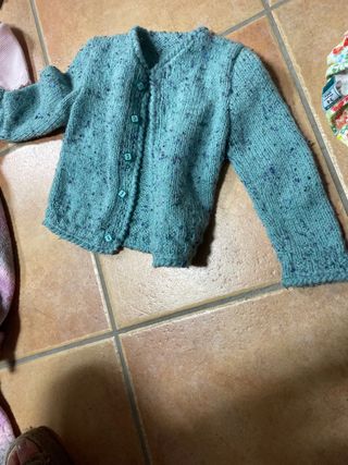 Chaqueta tejida a mano turquesa