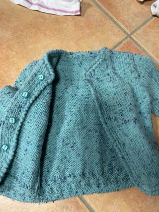 Chaqueta tejida a mano turquesa