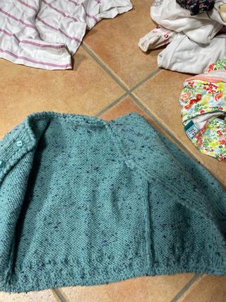 Chaqueta tejida a mano turquesa