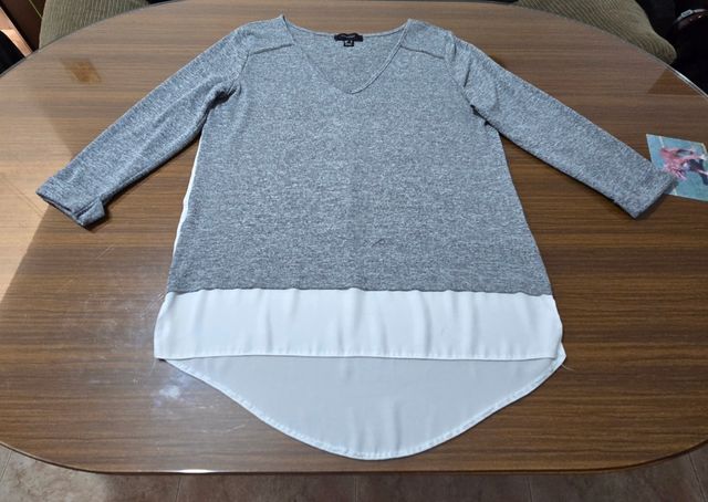 Jersey gris y blanco doble efecto.
