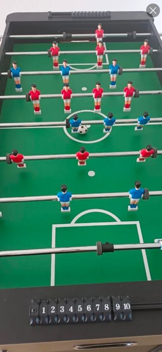 Futbolín de mesa.