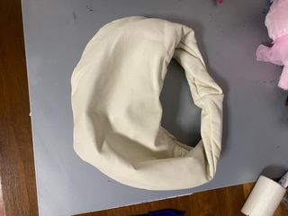 Bolso mano beige