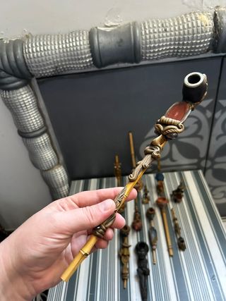 Collezione di 12 pipe decorative