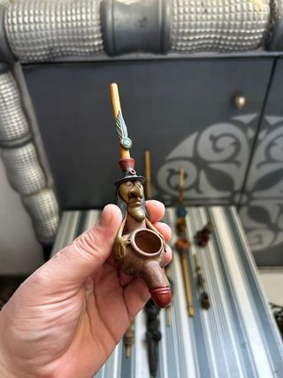 Collezione di 12 pipe decorative