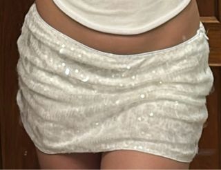 Mini falda blanca lentejuelas
