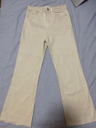 Pantalones campana beige