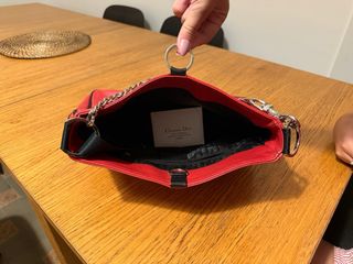 Bolso Dior rojo con tachuelas