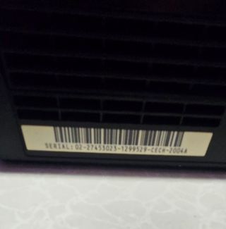 PS3 Slim negra + 15 juegos