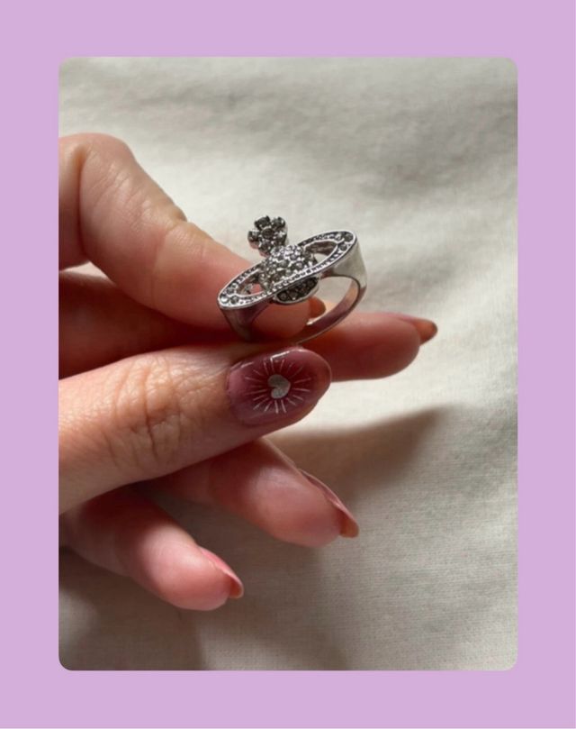 Anillo planeta acero plateado