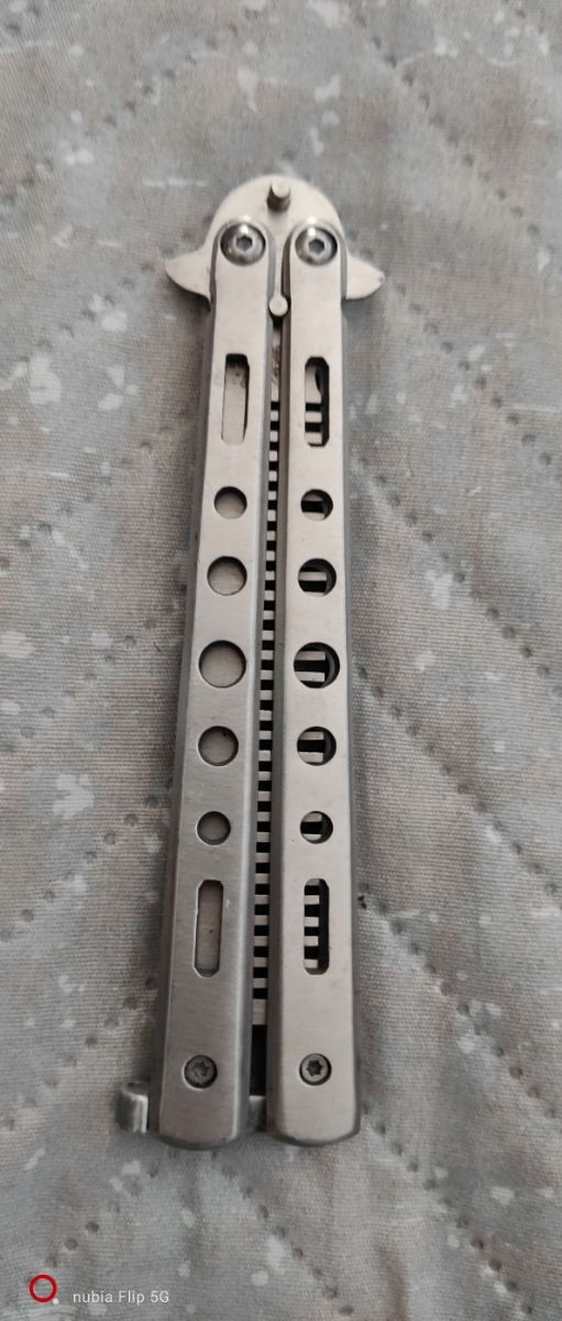 mariposa peine metálico