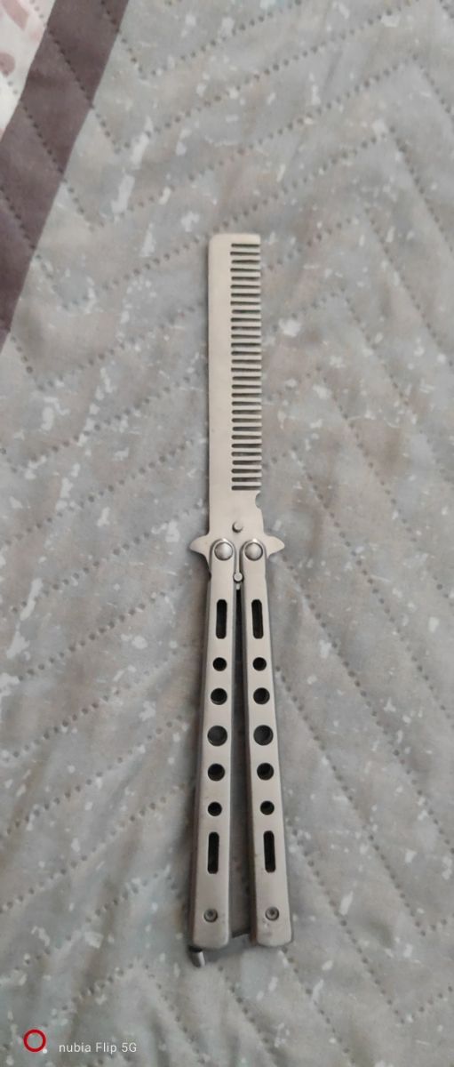 mariposa peine metálico