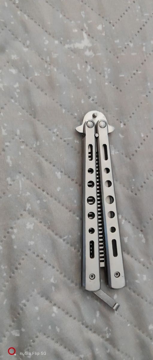 mariposa peine metálico