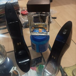 Lote de  7 frascos de perfume vacíos .son de marca