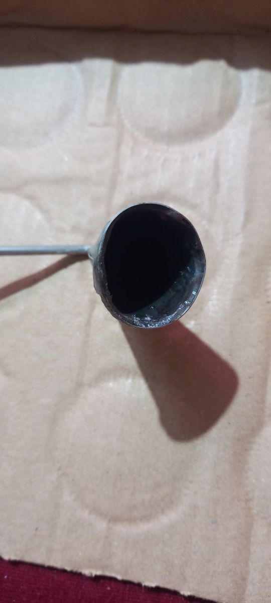 Apagavelas antiguo de metal