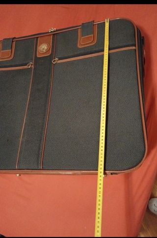 Maleta viaje gris y marrón. Con ruedas. 