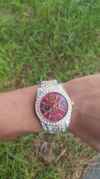 Reloj OASX rojo y plateado