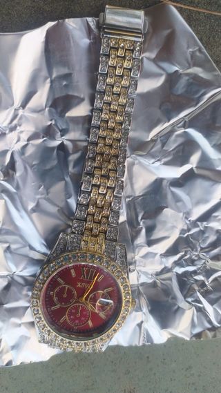 Reloj OASX rojo y plateado