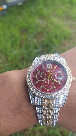 Reloj OASX rojo y plateado
