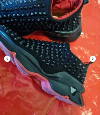 Louboutin - Sneakers con borchie nere