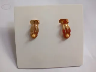 Pendientes dorados redondos