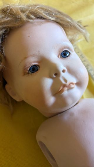 Parti bambola antica: testa e corpo