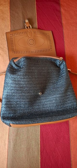 Mochila negra y marrón nueva.