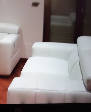 Divano Natuzzi bianco in pelle