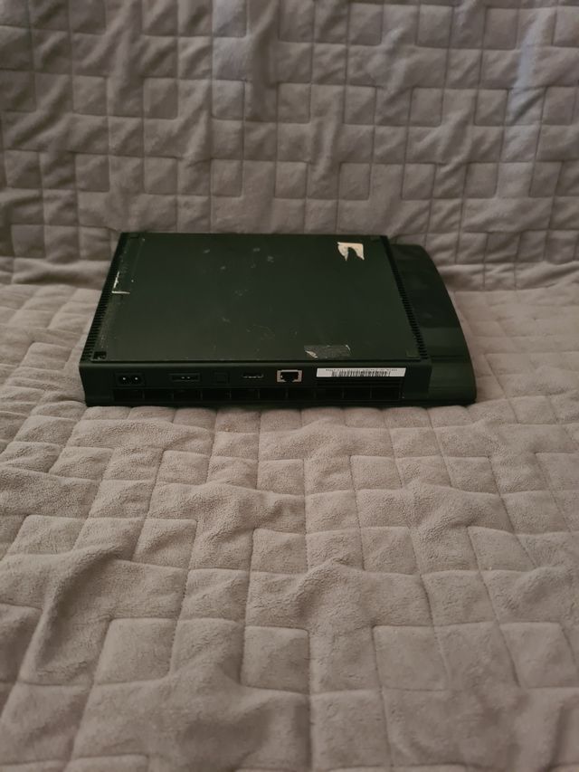 PS3 (PlayStation 3) Super Slim negra. 