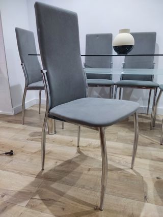 Mesa cristal 6 sillas grises