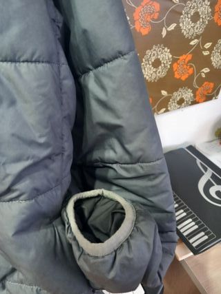 Chaqueta North Face Perrito gris/ negra reversible