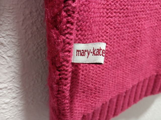 Cárdigan fucsia con cierre tipo trenca