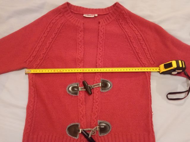 Cárdigan fucsia con cierre tipo trenca