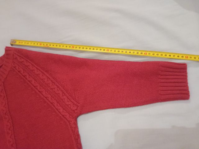 Cárdigan fucsia con cierre tipo trenca