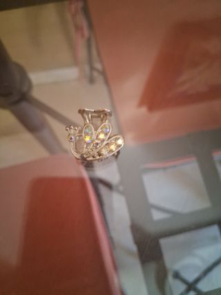 Pinza pelo pavo real brillante