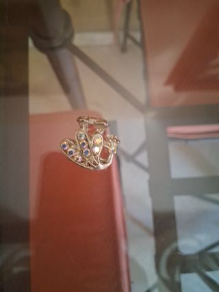 Pinza pelo pavo real brillante
